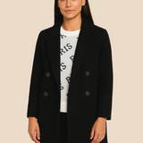 Stilren dobbeltradet damefrakke i uldlook med moderne pasform