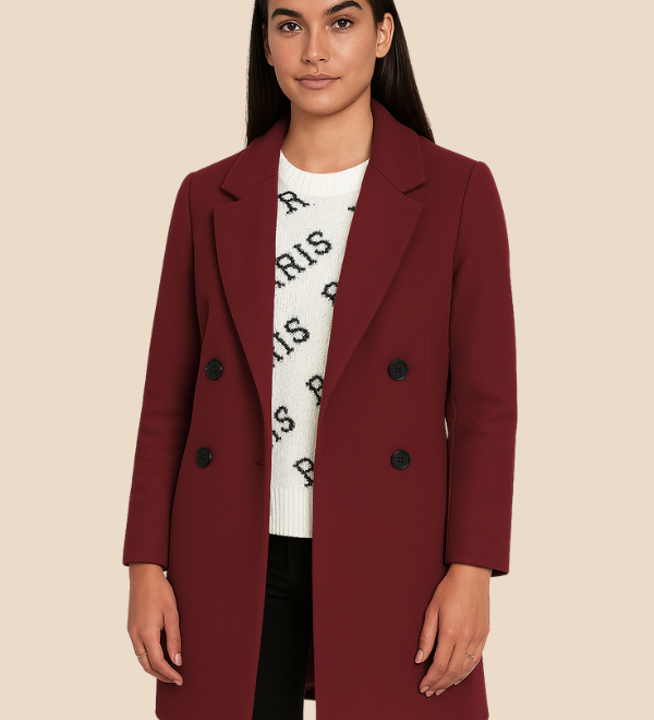 Stilren dobbeltradet damefrakke i uldlook med moderne pasform