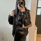 Kort pufferjakke med hætte – varm, trendy og ultralet