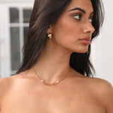 Tykke guld hoop øreringe til kvinder – moderne og elegant design