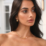 Tykke guld hoop øreringe til kvinder – moderne og elegant design