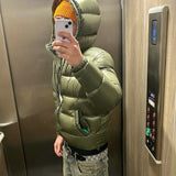 Kort pufferjakke med hætte – varm, trendy og ultralet