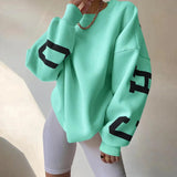 Oversized mintgrøn sweatshirt med print – streetwear til kvinder