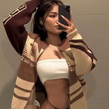 Oversized striktrøje med grafisk mønster og sporty look