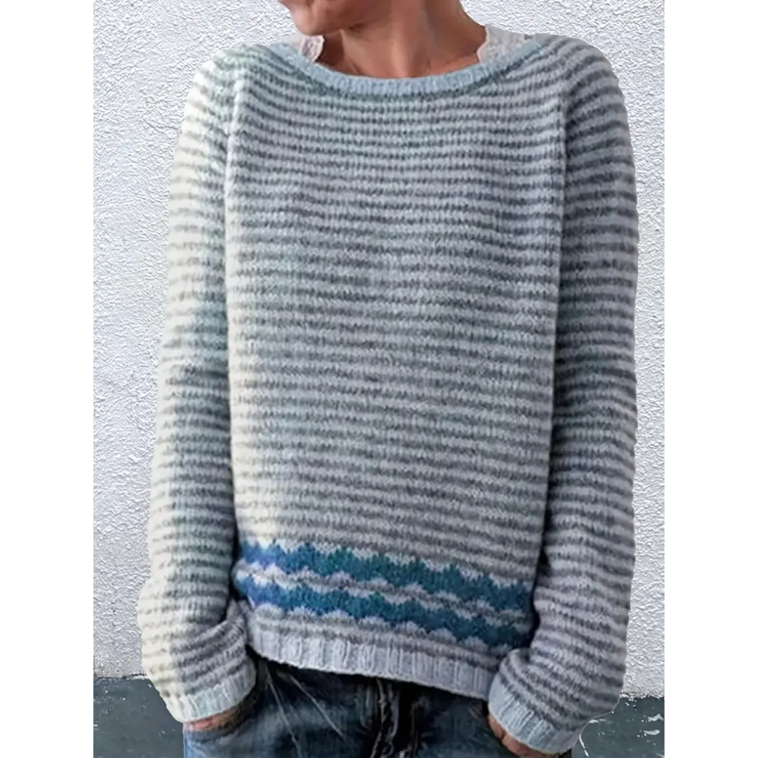 Lyserød og hvid stribet sweater med bølgemønster