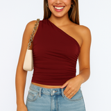 One-shoulder top med rynkedetaljer og tætsiddende pasform