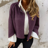 Elegant poncho-cardigan med knaplukning – blød og stilfuld