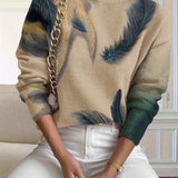 Striktrøje med fjerprint – Elegant og kunstnerisk look