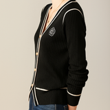 Elegant cardigan med kontrastkanter og blomstret broderi