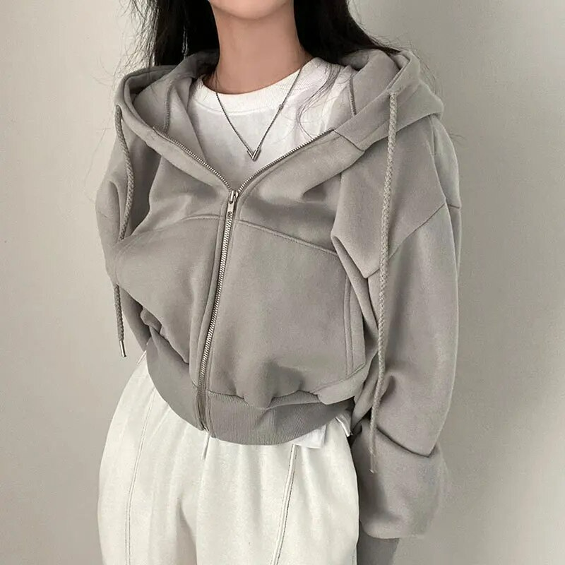 Cropped hættetrøje med lynlås og oversized ærmer til kvinder