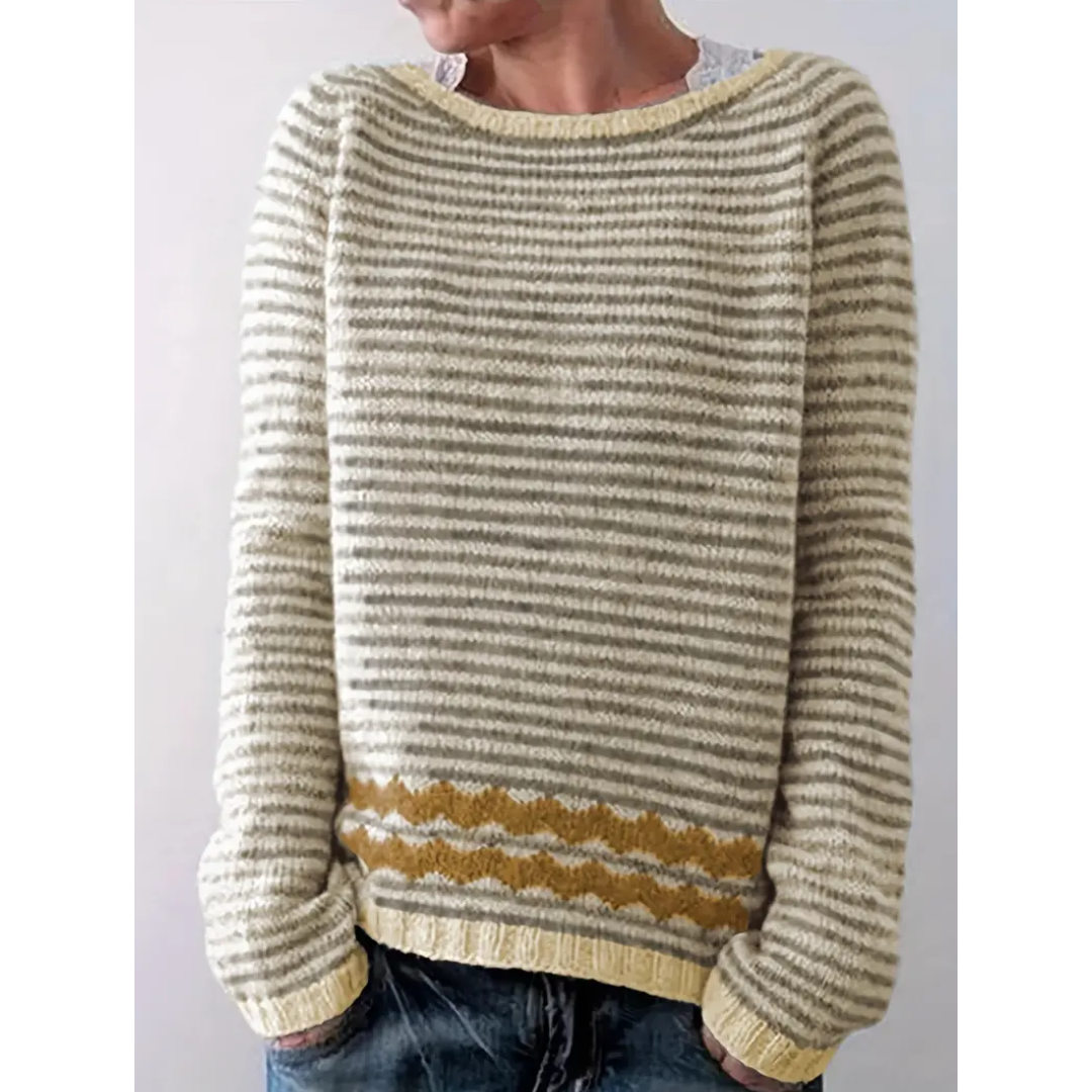 Lyserød og hvid stribet sweater med bølgemønster