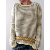 Lyserød og hvid stribet sweater med bølgemønster