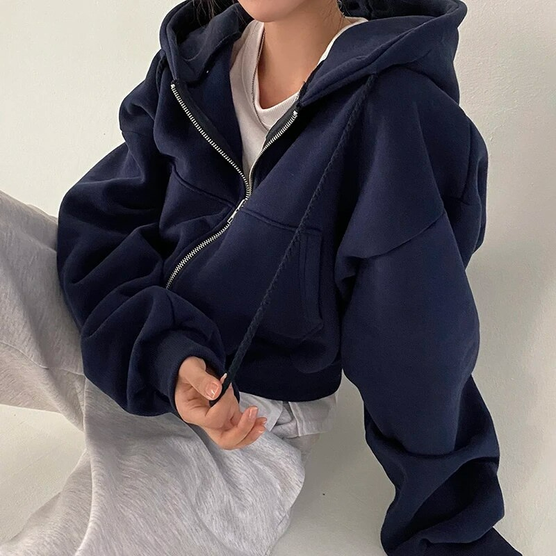 Cropped hættetrøje med lynlås og oversized ærmer til kvinder