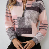 Patchwork Bluse med Lynlås – Moderne og Komfortabel Hverdagsstil