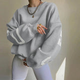 Oversized mintgrøn sweatshirt med print – streetwear til kvinder