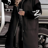 Lang teddyfrakke med hætte og statement-ærmer – varm og trendy