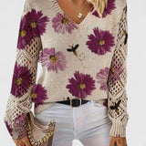 Blomstret V-Hals Bluse med Blondeærmer – Elegant og Feminin Stil
