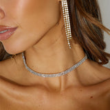 Lange rhinsten øreringe til kvinder – glamourøst og festligt design