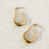 Unikke guld øreringe i organisk form – moderne og elegant design