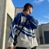 Oversized striktrøje med grafisk mønster og sporty look