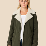 Varm teddyforet damejakke i blød fløjl med elegant krave