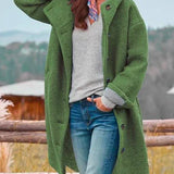 Lang strikfrakke med hætte og afslappet komfort