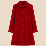 Elegant lang damefrakke i uldlook med klassisk knaplukning