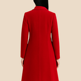 Elegant lang damefrakke i uldlook med klassisk knaplukning