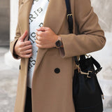 Elegant dobbeltknappet damefrakke med klassisk pasform