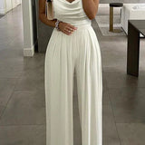 Elegant Jumpsuit med Draperet Top og Perlestropper