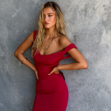 Lang aftenkjole med åben ryg og sløjfe