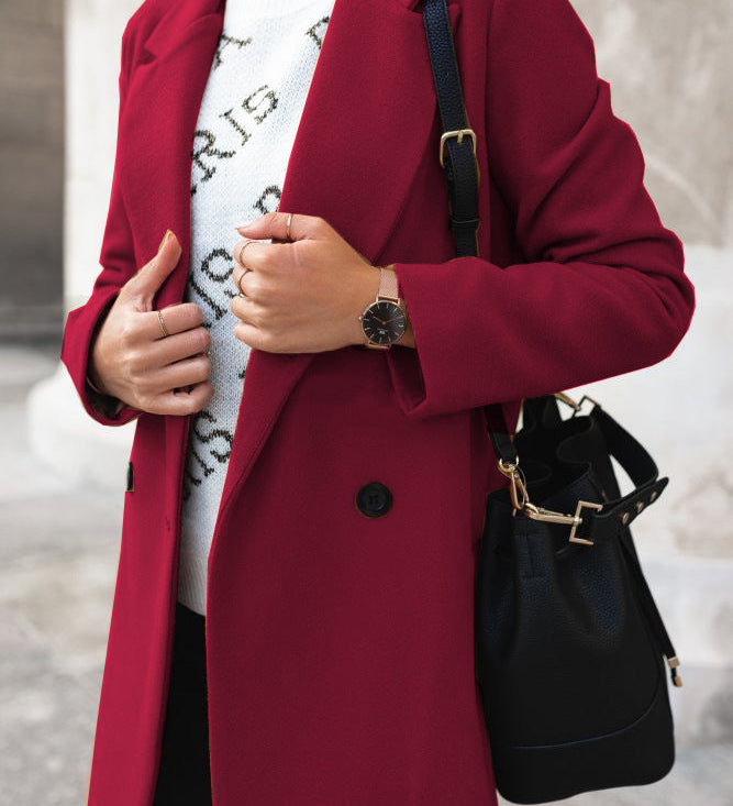 Elegant dobbeltknappet damefrakke med klassisk pasform