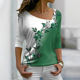 Elegant bluse med blomsterprint og asymmetrisk hals – Trekvartærmer