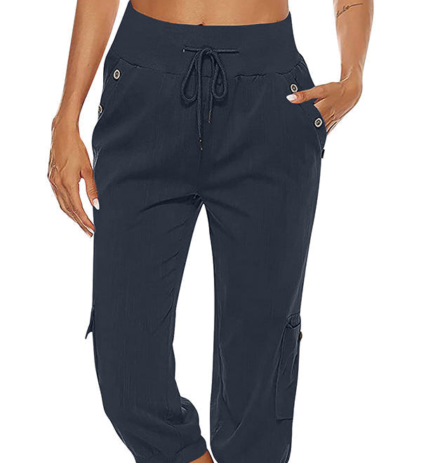 Capri Bukser med Knapdetaljer og Elastisk Talje – Komfortabel Sommerstil