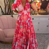 Elegant sommerkjole til kvinder med blomsterprint og V-hals