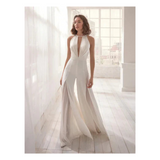 Elegant Halterneck Jumpsuit med Slør-Overdel og Dyb Udskæring