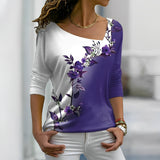 Elegant bluse med blomsterprint og asymmetrisk hals – Trekvartærmer