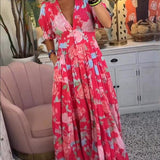 Elegant sommerkjole til kvinder med blomsterprint og V-hals