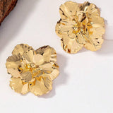 Store guld blomsterøreringe til kvinder – luksuriøst og elegant design