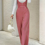 Retro dame jumpsuit med ternet mønster og brede ben