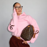 Cropped hoodie med broderede detaljer og afslappet pasform