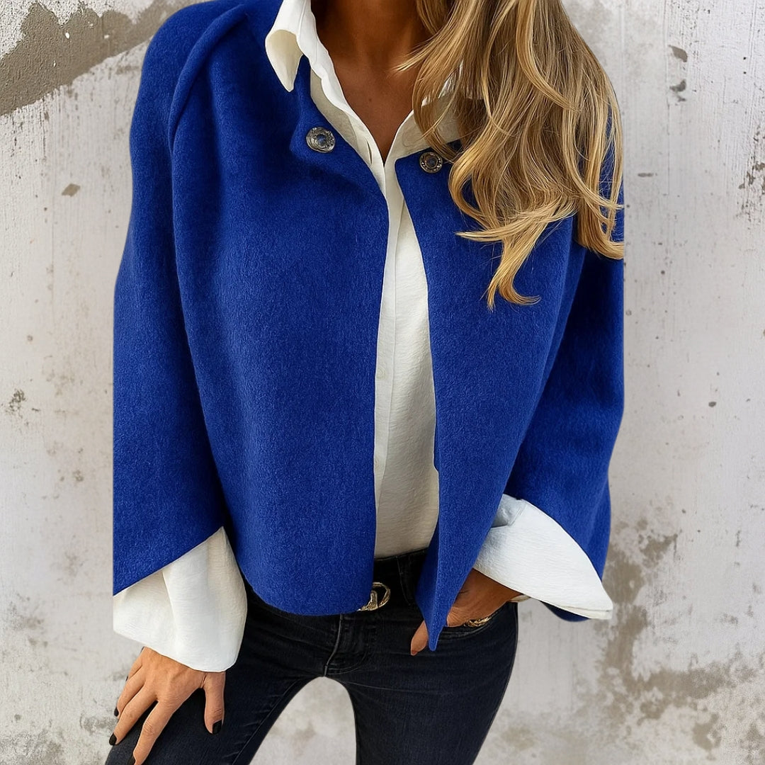 Elegant poncho-cardigan med knaplukning – blød og stilfuld