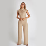 Elegant Ærmeløs Jumpsuit med Bindebælte – Let og Stilfuld