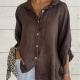 Løs Skjortebluse med Oprullede Ærmer – Let og Elegant Hverdagsstil