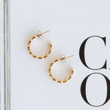 Guld snoede hoop øreringe til kvinder – elegant og tidløst design