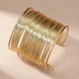 Sæt med Tynde Guld Bangles – Elegant Lag-På-Lag Look