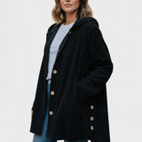Oversize jakke med hætte og dekorative knapper – afslappet stil til hverdag og fritid