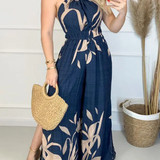Sommer jumpsuit til kvinder med halterneck og bladmønster