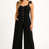 Dame jumpsuit med knaplukning og brede ben