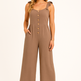 Dame jumpsuit med knaplukning og brede ben